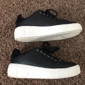 Black platform sneakers